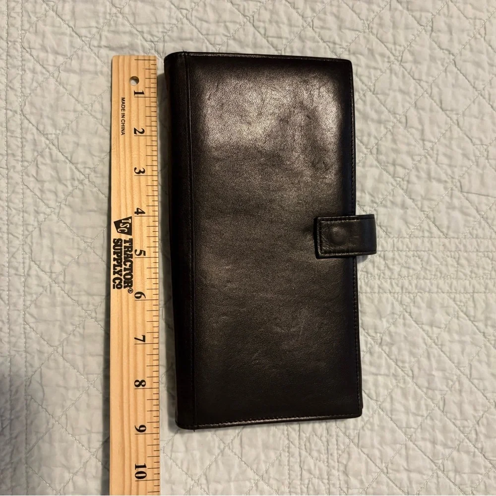 Tumi travel wallet passport card organizer.
